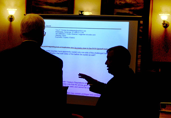Attorney Joe Friedberg objects to an exhibit document which referred to absentee ballots with attorney David Lillehaug standing to the left.