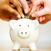 Saving in a piggy bank 