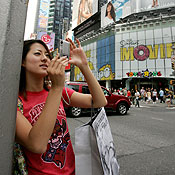 A tourist takes a picture 