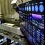 Traders work at the New York Stock Exchange