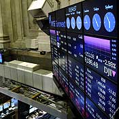 Traders work at the New York Stock Exchange 