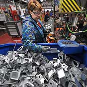 An employee works on the production line 