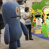 An 'Ugly Doll' mascot greets people at Toy Fair 