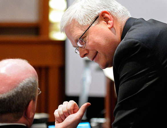 Al Franken attorneys David Lillehaug, right, and Marc Elias confer during the Senate vote recount trial Wednesday, Feb. 18, 2009 in St. Paul. Minn.
