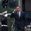 President Barack Obama salutes a U.S. Marine