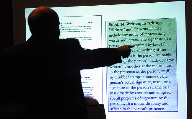 Attorney Marc Elias makes a point during the U.S. Senate election trial at Minnesota Judicial Center in St. Paul, Minn.