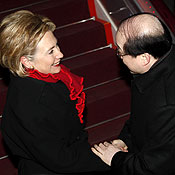 Hillary Clinton greets a Chinese foreign minister 
