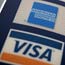 Logos for credit card companies AmEx and Visa