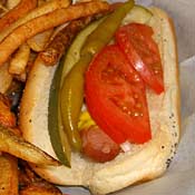 A Chicago-style hot dog and fries. 