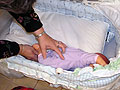 Baby in bassinet