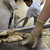 Workers at a Jewish bakery prepare for Passover 