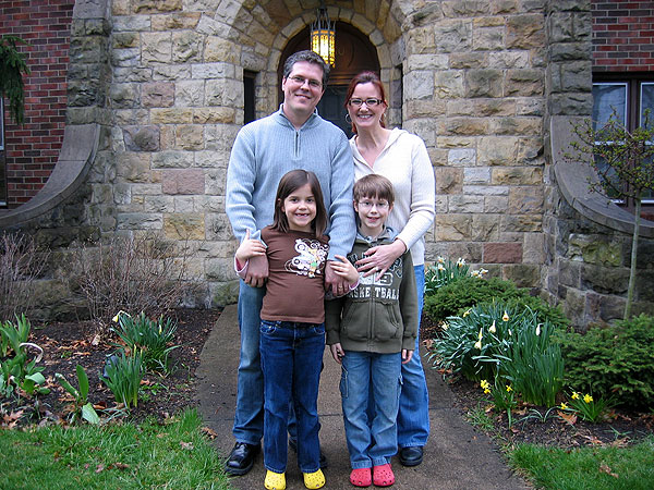 
                Tyler and Jaci Clark stand with their son Boston and daughter Ridley. The Clarks moved back to Youngstown a few years ago.
                                    (Amy Scott/Marketplace)
                                