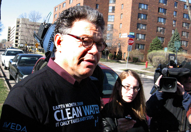 DFL Senate candidate Al Franken speaks to reporters following an Earth Day event in Minneapolis, April 22, 2009.