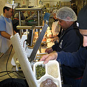 Volunters prepare food for Meals on Wheels program 