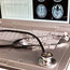 A stethoscope resting on a laptop
