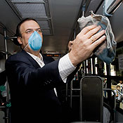 Mexico City's mayor cleans a handrail 