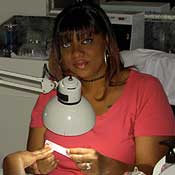 Nail salon owner Dametra Adams was able to open her business without a loan using money saved from working as a cocktail waitress at a casino in Tunica County.