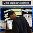 A job seeker looks at job listings