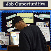 A job seeker looks at job listings 