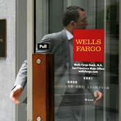 A Wells Fargo customer enters a bank branch 