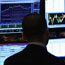 A trader works at the New York Stock Exchange