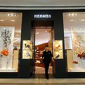 A staffer walks out of an Hermes outlet 