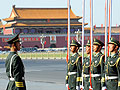 A Chinese paramilitary police stands guard