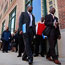 Job seekers wait in line for a job fair in Chicago