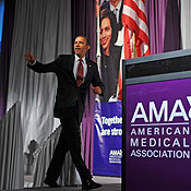 President Obama walks on stage to address the AMA 