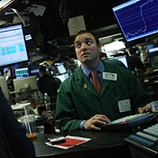 Trader works on the floor of the NYSE 