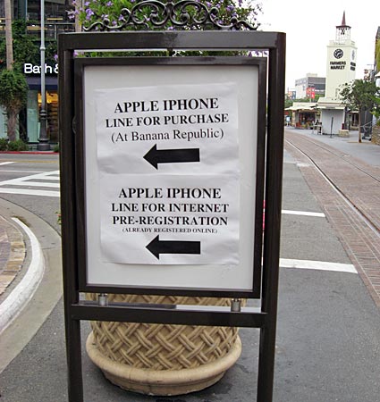 
                Signs posted at The Grove shopping center in Los Angeles to direct people who came to buy the latest generation of the iPhone.
                                    (Stacey Vanek-Smith / Marketplace)
                                
