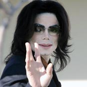 Michael Jackson waves to fans at trial 