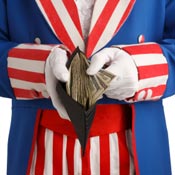 Uncle Sam holds wallet filled with cash. 
