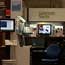 A TV plays at the NYSE Goldman Sachs booth
