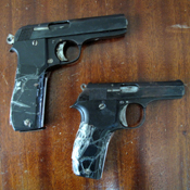 A photo of a real Makarov gun next to a fake one 