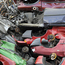 Wrecked cars are piled up on a scrapyard