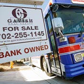 Bus on a tour of foreclosed homes. 