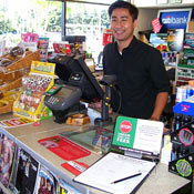 Long Nguyen, 28, owns this 7-Eleven franchise in Santa Clarita, Calif. He's collected roughly 1,000 signatures from customers.