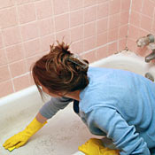 Maid cleaning tub. 