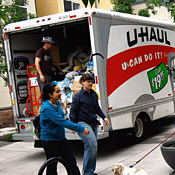 A renter packs his things into a UHaul 