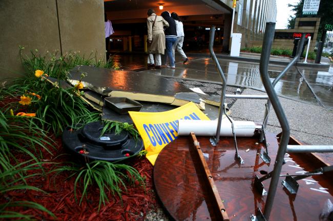 Debris thrown around outside the Convention Center after severe weather swept through Minneapolis.