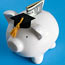 Piggy bank with mortarboard