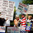 Demonstrators at health care forum