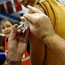 A dose of flu vaccination is administered