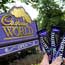 Cadbury Dairy Milk bars in front of Cadbury sign