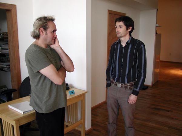 Dr. Sam Willis talks with patient Nathan Stanley, a woodcarver, in his office in Northeast Minneapolis. Dr. Willis specializes in offering affordable health care to artists and other un- and under-insured patients.
