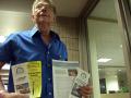 Bill Kurtz shows his brochures