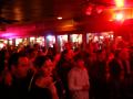 A crowd gathers at the Uptown Bar & Cafe