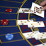 A croupier deals cards on a Black Jack table