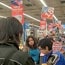 Customers line up at a Lider store in Chile